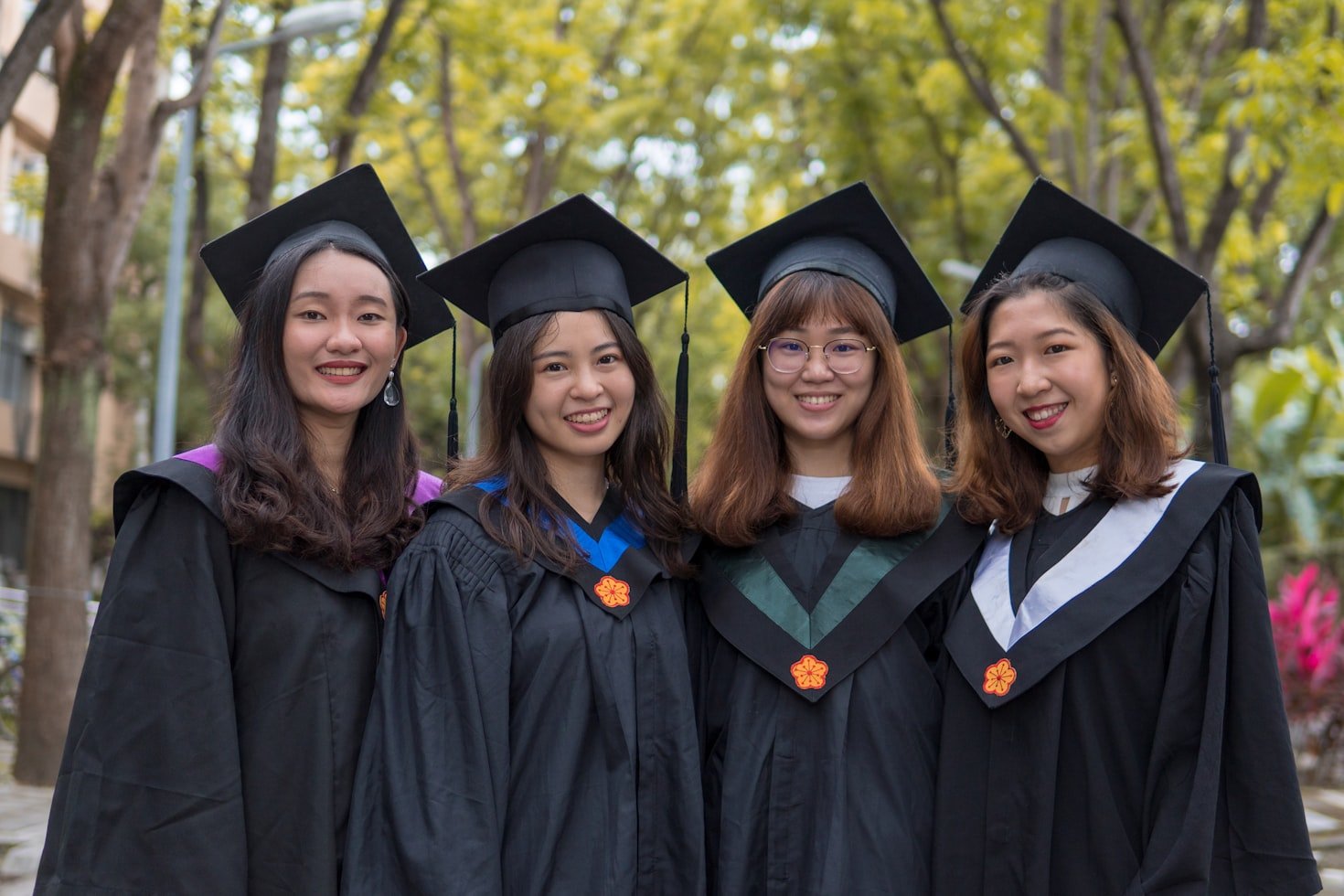 University graduates standing together outdoors
